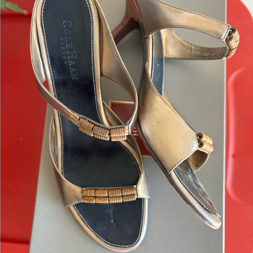 Cole Haan Metallic Gold Slip in Heels with wood bead Accent